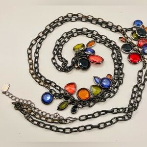 30 inch black chain with jewel tone gemstone clusters. Has 4 inch extender.